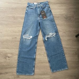 Levi's high loose ripped knee jean in mid wash